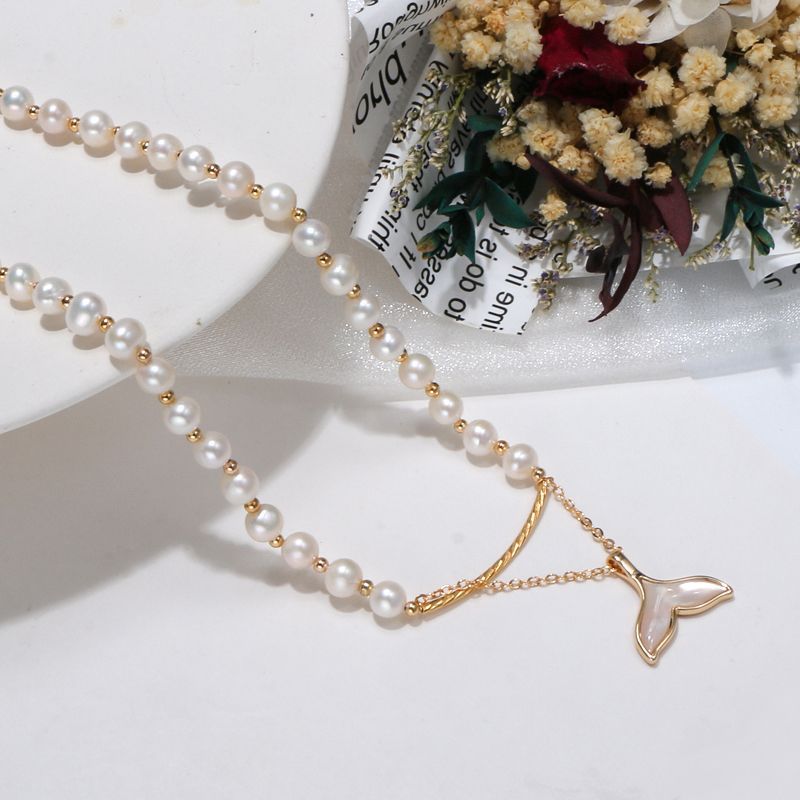 Buy now the beautiful Mermaid Tail Pearl Necklace from Amore Jewellery
