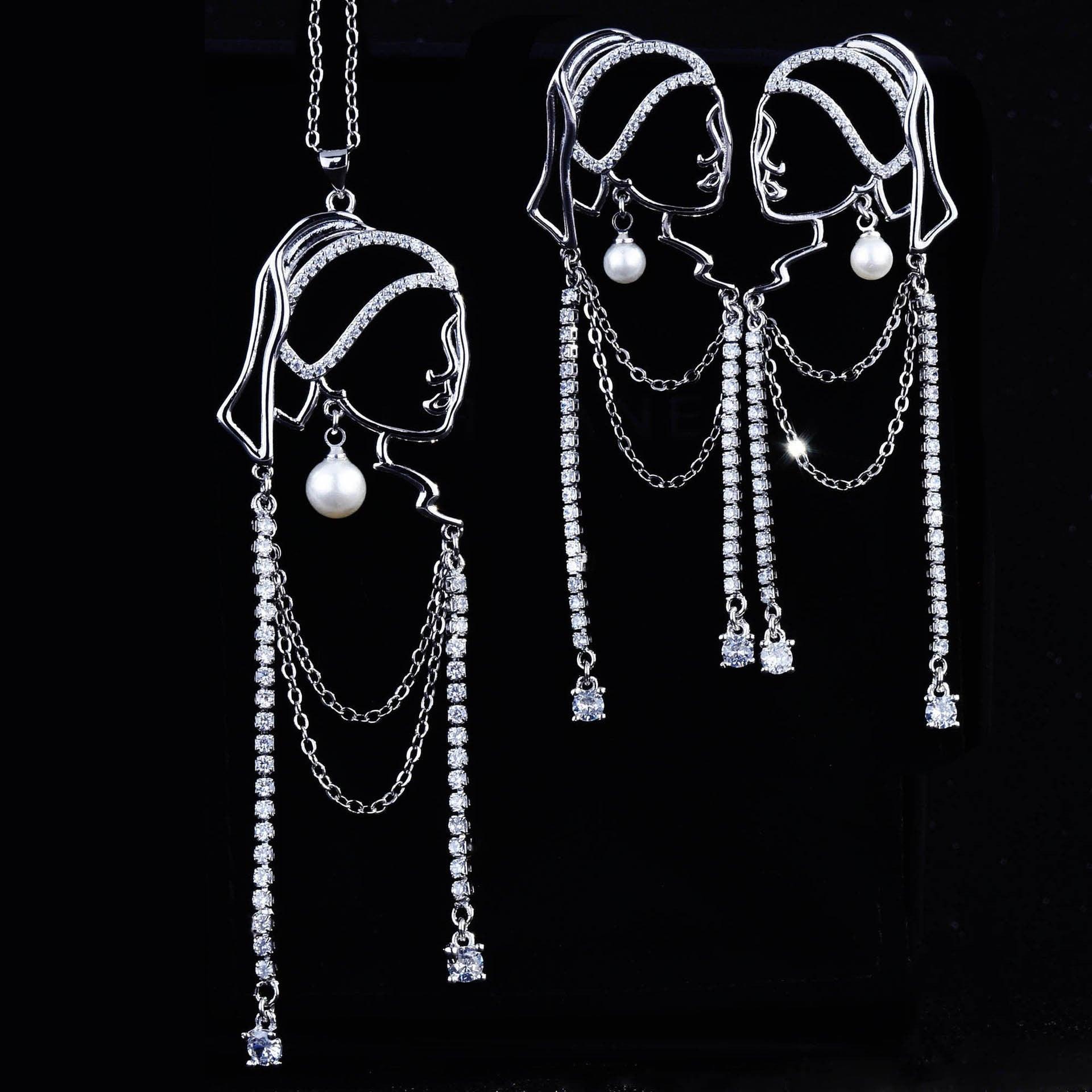 Buy now the beautiful Girl with the Pearl Necklace set from Amore Jewellery